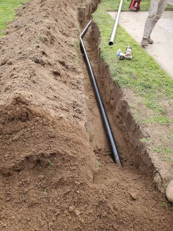 New residential pipe installed in an open trench